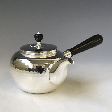 No.yk6bb,Silver teapot with ebony handle and knob, design is beaten surface (large),about 0.2L