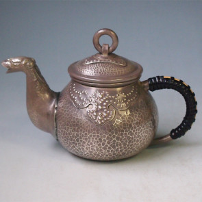 No.uk119, Silver teapot, design is beaten pattern, pinkish color with beast spout , nearly 0.2L