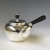 No.yk6bb,Silver teapot with ebony handle and knob, design is beaten surface (large),about 0.2L